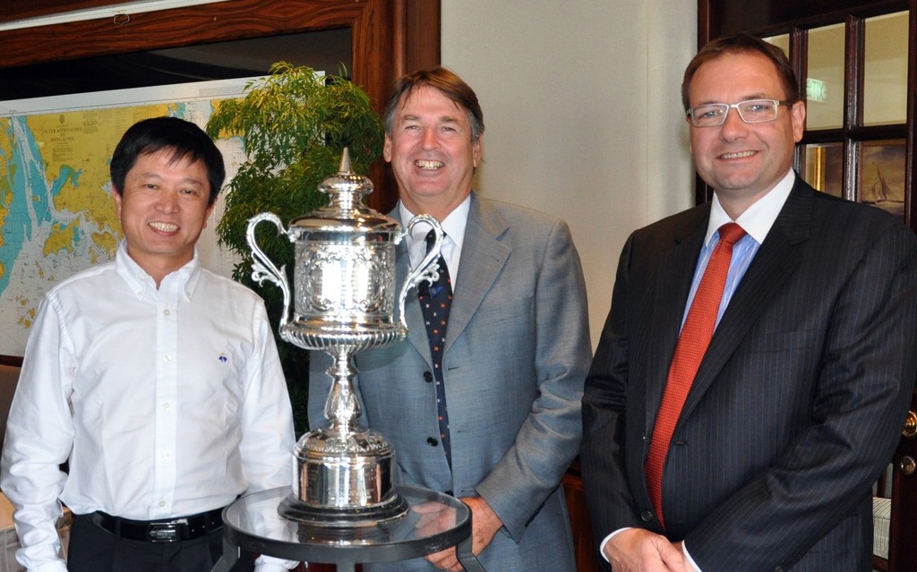 (from left to right)   Mr Liu Rui-Jin, Chairman of ZhouKe (Hong Kong) International Holdings, Mr Warwick Downes, Commodore of RHKYC and Mr Ray Parry, General Manager of RHKYC with the La Cigale Trophy (the perpetual trophy of the Around The Island Race). © RHKYC/Koko Mueller